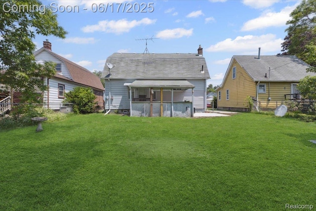 3920 Clark St, Canton, MI 48184 - back of property with a chimney and a shingled roof