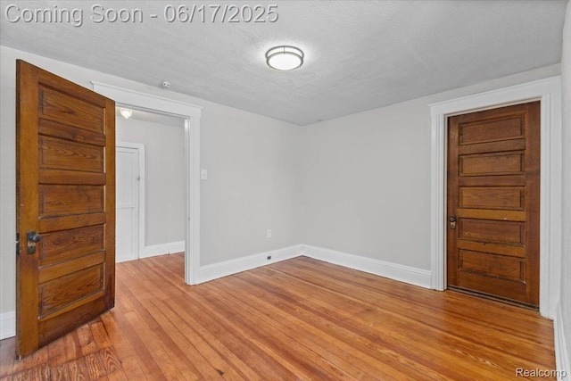 3920 Clark St, Canton, MI 48184 - unfurnished room with light wood-style floors and a textured ceiling