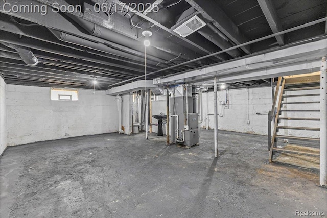 3920 Clark St, Canton, MI 48184 - below grade area featuring heating unit and stairs