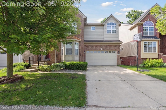 51159 Luke Ln, Novi, MI 48374 - traditional-style house with driveway, a garage, brick siding, and a front lawn
