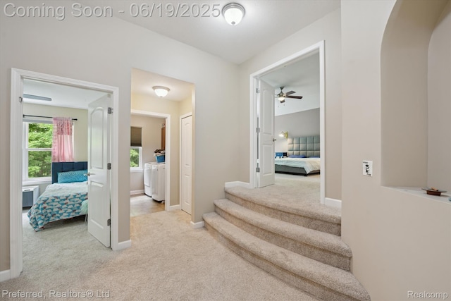 51159 Luke Ln, Novi, MI 48374 - corridor featuring carpet, arched walkways, and stairs
