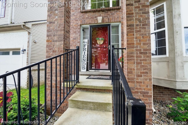 51159 Luke Ln, Novi, MI 48374 - property entrance featuring brick siding and a garage