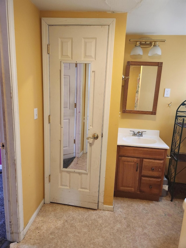 222 Scribner St, Delton, MI 49046 - bathroom featuring vanity and baseboards