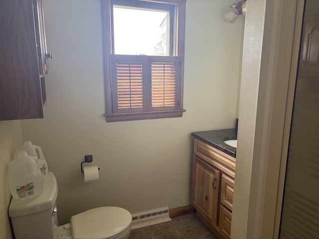 10510 S Hemlock, Brant, MI 48614 - bathroom featuring vanity and a baseboard radiator
