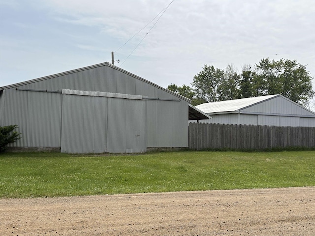10510 S Hemlock, Brant, MI 48614 - view of pole building with a lawn