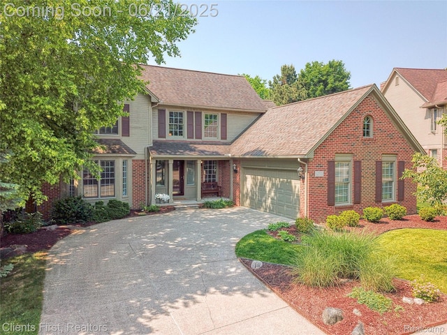 1070 Pointe Place Ct, Rochester, MI 48307 - traditional home with brick siding, roof with shingles, a garage, and concrete driveway