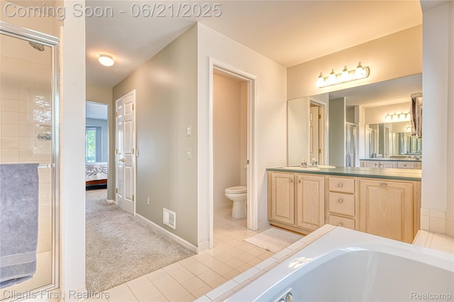 1070 Pointe Place Ct, Rochester, MI 48307 - bathroom featuring double vanity, ensuite bath, tile patterned floors, a tile shower, and a bath
