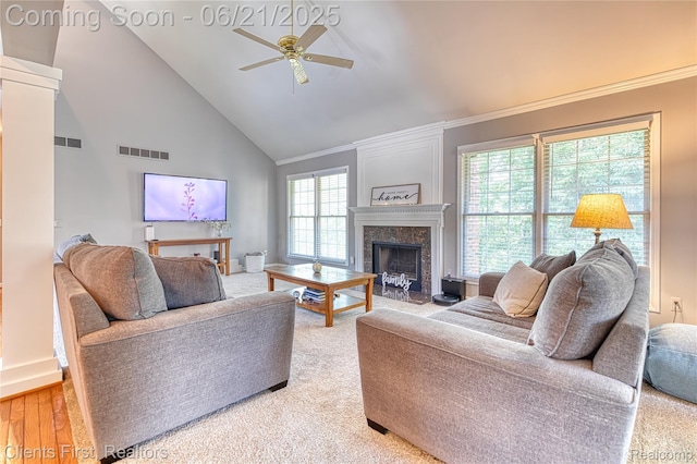 1070 Pointe Place Ct, Rochester, MI 48307 - living area featuring ceiling fan, crown molding, a fireplace, high vaulted ceiling, and light carpet