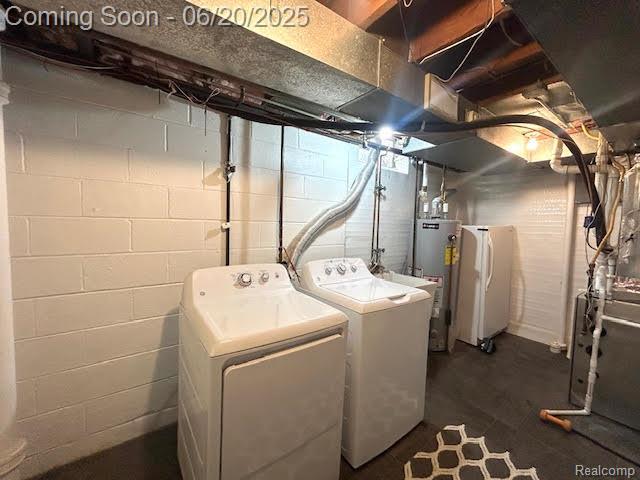 30821 Longfellow Ave, Madison Heights, MI 48071 - laundry area with independent washer and dryer and electric water heater