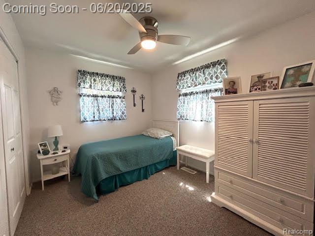 30821 Longfellow Ave, Madison Heights, MI 48071 - bedroom with multiple windows, carpet floors, a closet, and a ceiling fan