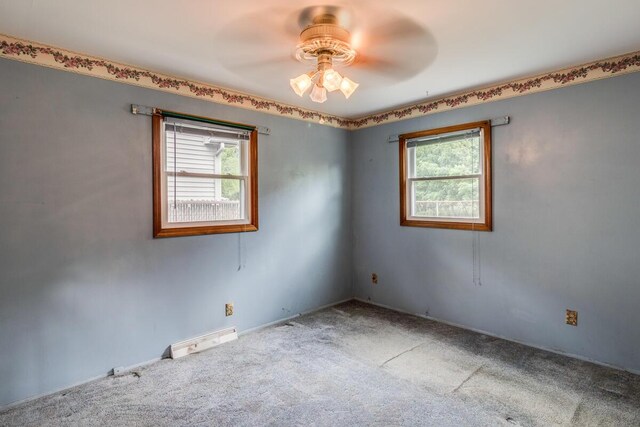 275 Pawnee St, Battle Creek, MI 49014 - carpeted spare room with plenty of natural light and a ceiling fan