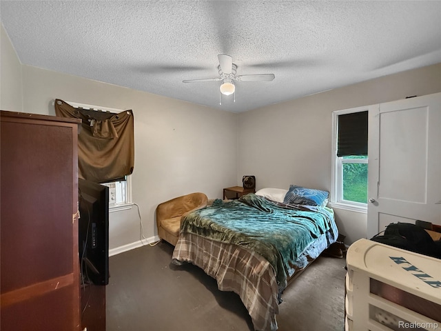 20115 Pelkey St, Detroit, MI 48205 - bedroom with a textured ceiling, ceiling fan, and concrete flooring