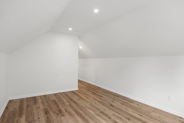 807 Barrington Rd, Grosse Pointe Park, MI 48230 - bonus room with lofted ceiling, wood finished floors, and recessed lighting