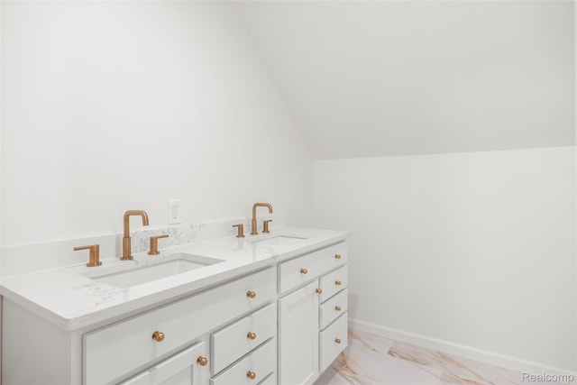 807 Barrington Rd, Grosse Pointe Park, MI 48230 - bathroom featuring marble finish flooring, lofted ceiling, and double vanity