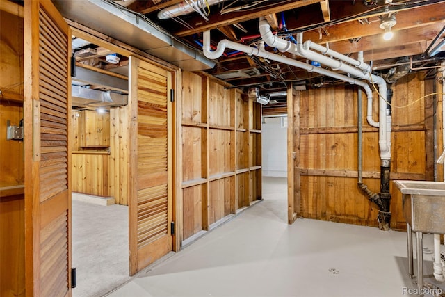 807 Barrington Rd, Grosse Pointe Park, MI 48230 - unfinished below grade area featuring wooden walls