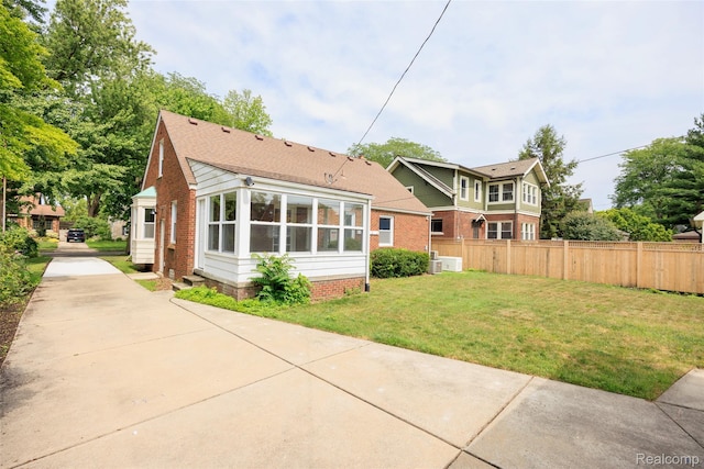 807 Barrington Rd, Grosse Pointe Park, MI 48230 - back of house featuring brick siding
