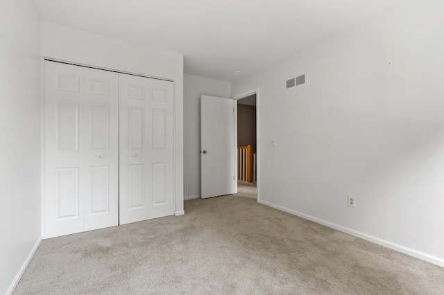 3745 Cedaridge Rd, Kalamazoo, MI 49008 - unfurnished bedroom with carpet flooring and a closet