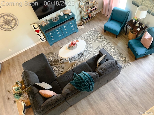 11236 Chyna Run, Davisburg, MI 48350 - living area with wood finished floors and baseboards