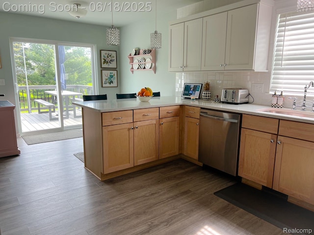 11236 Chyna Run, Davisburg, MI 48350 - kitchen with dishwasher, a peninsula, light countertops, and dark wood-style flooring