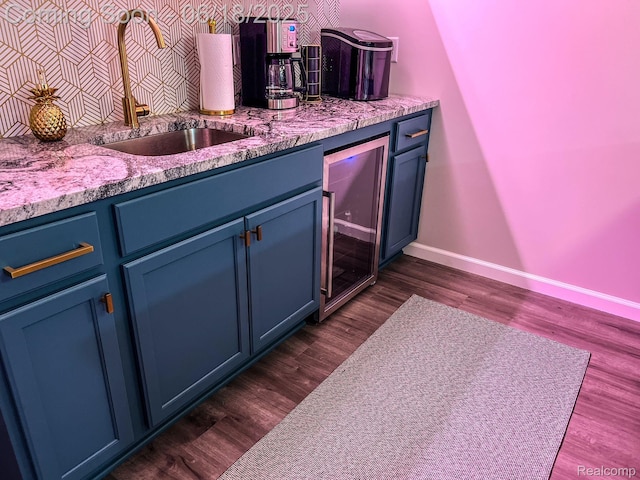 11236 Chyna Run, Davisburg, MI 48350 - indoor bar with wine cooler and dark wood finished floors