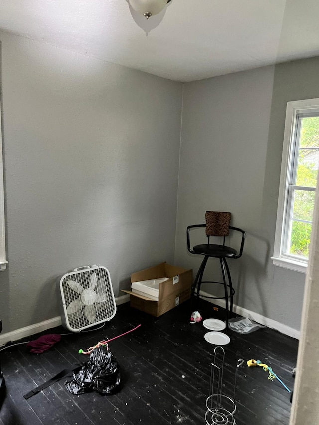 8627 Stout St, Detroit, MI 48228 - rec room featuring baseboards and wood finished floors