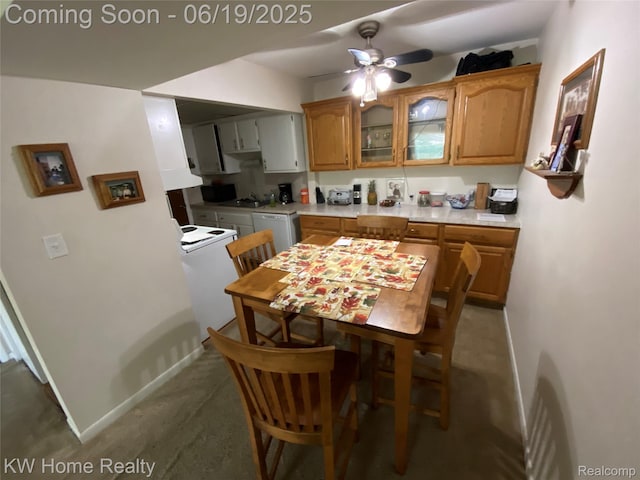 3901 Fort St Unit 204, Trenton, MI 48183 - kitchen featuring white appliances, light countertops, a ceiling fan, glass insert cabinets, and brown cabinets