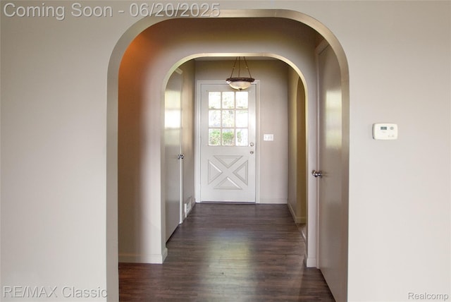 1861 Ladd Rd, Wolverine Lake, MI 48390 - hall with wood finished floors and arched walkways