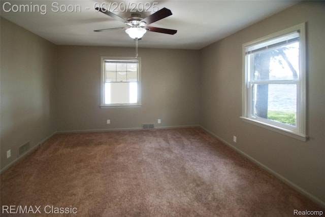 1861 Ladd Rd, Wolverine Lake, MI 48390 - empty room featuring a ceiling fan and carpet floors