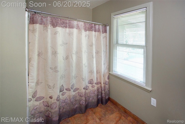 1861 Ladd Rd, Wolverine Lake, MI 48390 - full bathroom with tile patterned floors and curtained shower