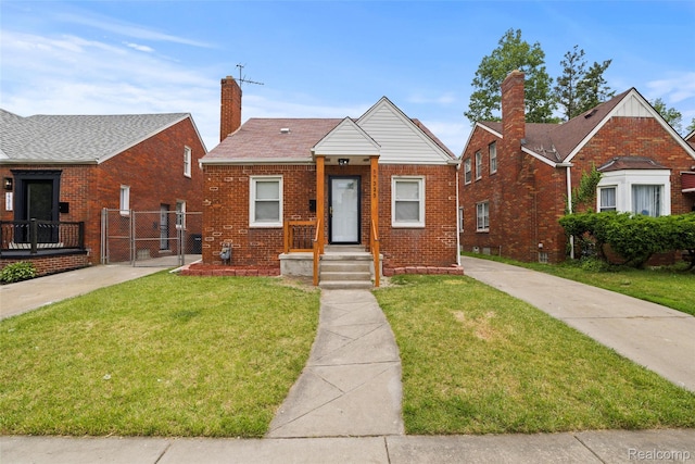 17325 Mansfield St, Detroit, MI 48235 - bungalow featuring a gate, brick siding, and a chimney