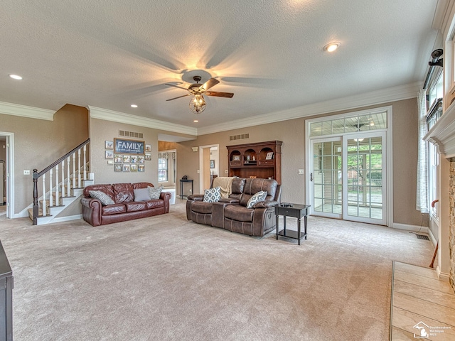 831 Saint James Park Ave, Monroe, MI 48161 - living room featuring carpet flooring, ceiling fan, stairs, a textured ceiling, and ornamental molding