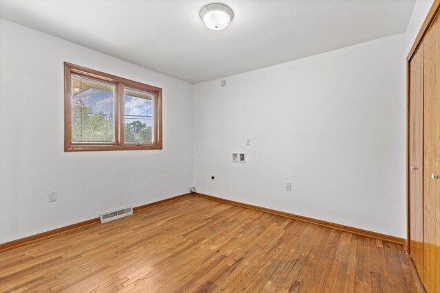 1228 Orchid St, Waterford, MI 48328 - empty room with light wood-type flooring and baseboards