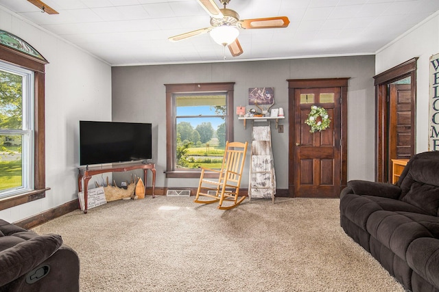 3833 S Baldwin Ave, Fremont, MI 49412 - living area featuring crown molding, carpet floors, and a ceiling fan