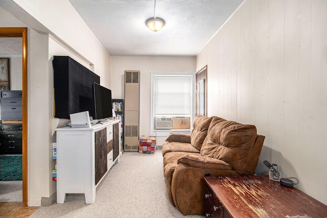 630 State St, Fremont, MI 49412 - living area featuring light carpet, cooling unit, and wood walls