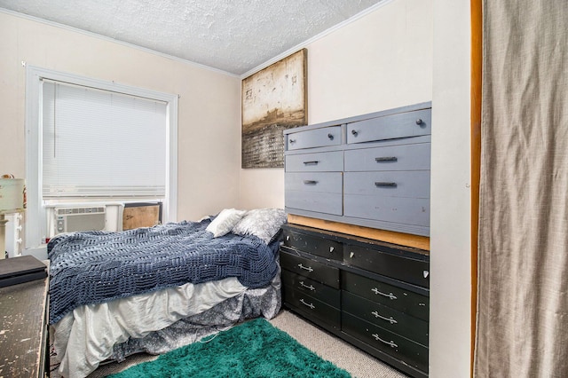 630 State St, Fremont, MI 49412 - carpeted bedroom featuring a textured ceiling, crown molding, and cooling unit