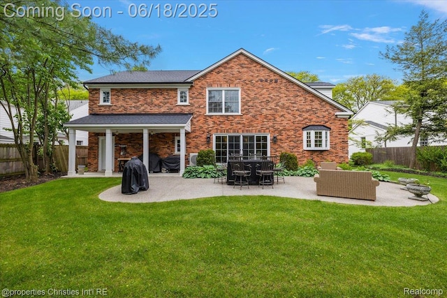 586 Fairfax St, Birmingham, MI 48009 - rear view of house with a patio, a fenced backyard, and brick siding