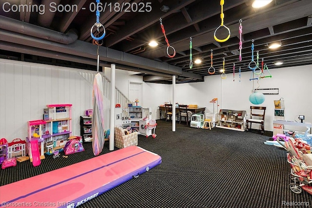 586 Fairfax St, Birmingham, MI 48009 - finished below grade area featuring carpet floors and stairway