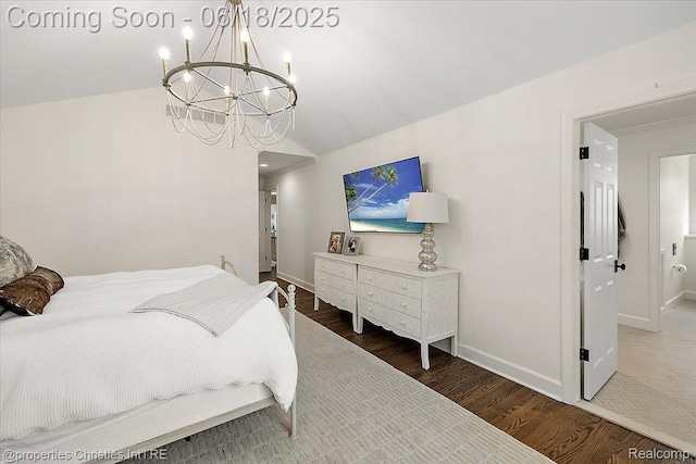 586 Fairfax St, Birmingham, MI 48009 - bedroom featuring wood finished floors, a chandelier, and vaulted ceiling