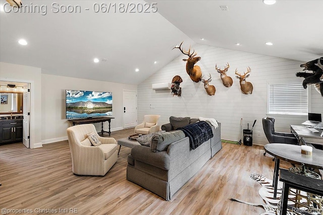 586 Fairfax St, Birmingham, MI 48009 - living room with lofted ceiling, light wood-style floors, recessed lighting, and wooden walls