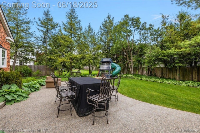 586 Fairfax St, Birmingham, MI 48009 - fenced backyard featuring a patio area and outdoor dining area