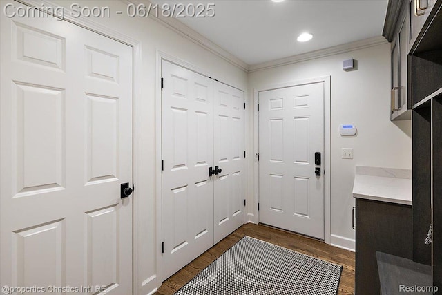 586 Fairfax St, Birmingham, MI 48009 - entryway with crown molding, dark wood-style floors, and recessed lighting