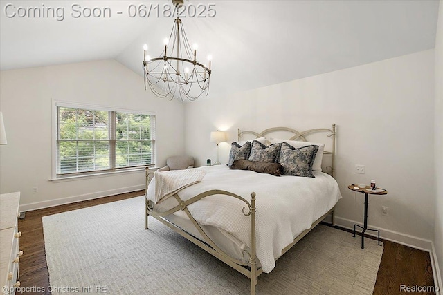 586 Fairfax St, Birmingham, MI 48009 - bedroom featuring a chandelier, vaulted ceiling, and wood finished floors
