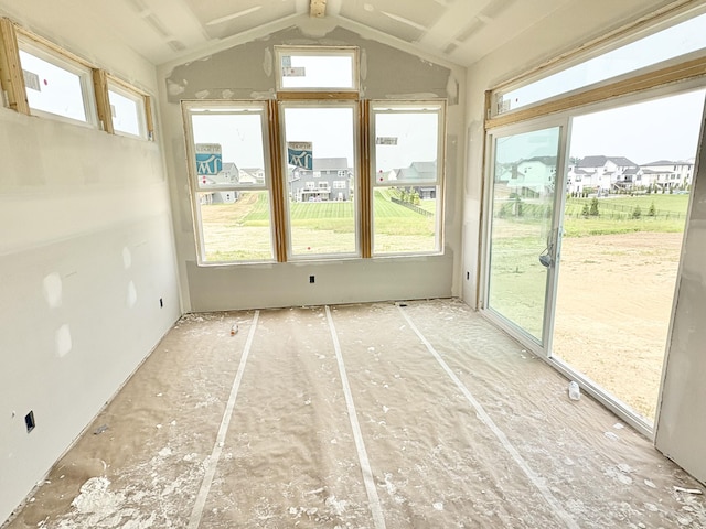 3447 Conrail Dr SW, Byron Center, MI 49315 - unfurnished sunroom featuring healthy amount of natural light and vaulted ceiling