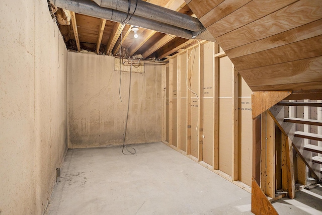 1602 Mccann Rd, Hastings, MI 49058 - unfinished basement featuring stairs