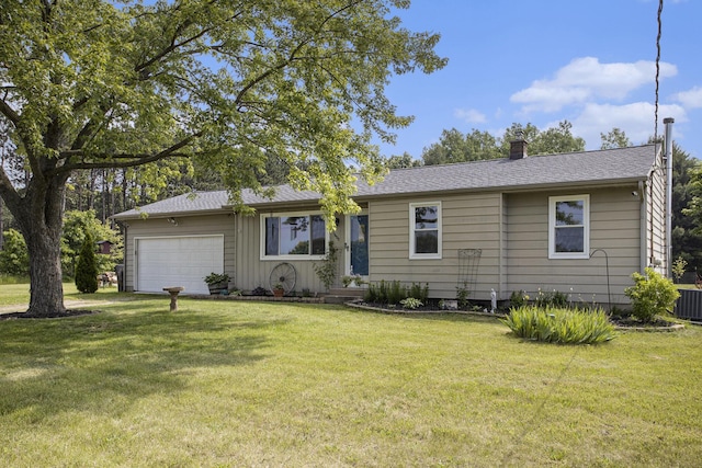 1602 Mccann Rd, Hastings, MI 49058 - single story home with an attached garage, a chimney, a front yard, and board and batten siding