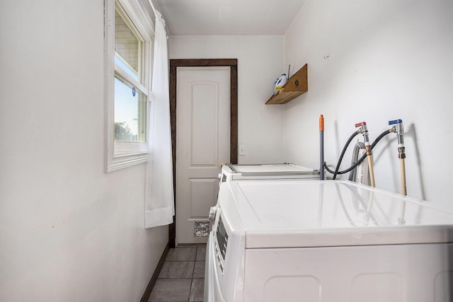 1602 Mccann Rd, Hastings, MI 49058 - laundry area with washing machine and clothes dryer and baseboards