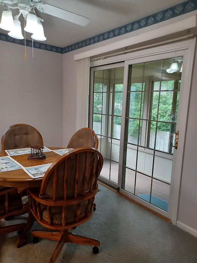 3144 Amsterdam Dr, Clio, MI 48420 - carpeted dining room featuring plenty of natural light and ceiling fan