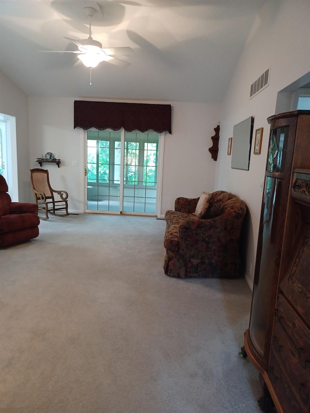 3144 Amsterdam Dr, Clio, MI 48420 - sitting room with lofted ceiling, a ceiling fan, and carpet flooring