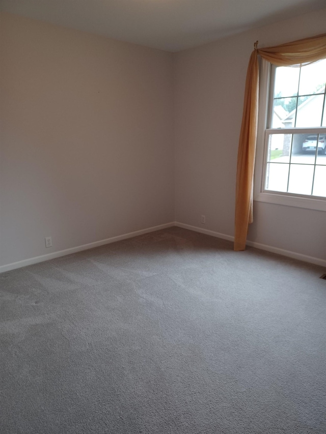 3144 Amsterdam Dr, Clio, MI 48420 - carpeted spare room with baseboards