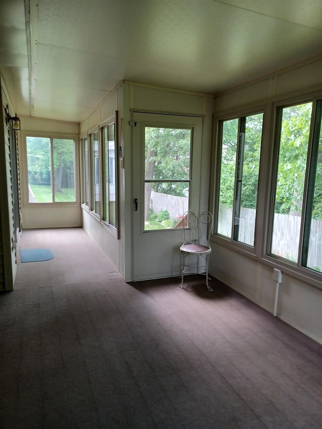 3144 Amsterdam Dr, Clio, MI 48420 - sunroom featuring carpet floors and plenty of natural light